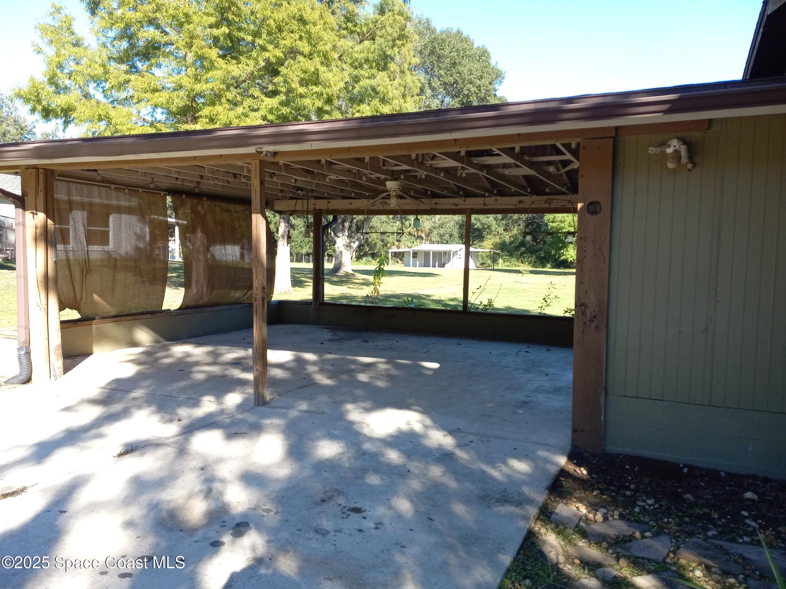 4335 Kumquat Street Cocoa, FL 32926 - Photo 20 of 21 a view of a porch