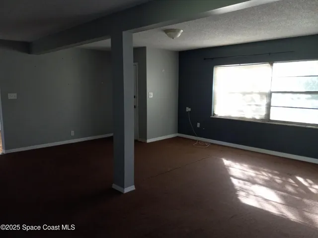 a view of a livingroom with a chandelier