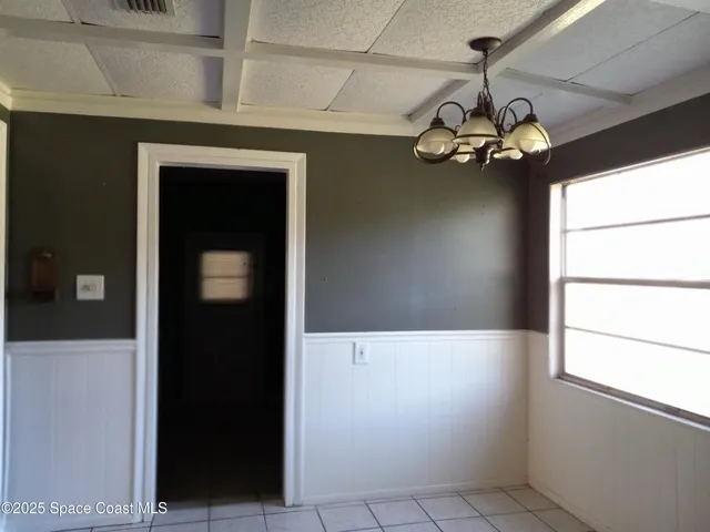 a room with furniture and a window