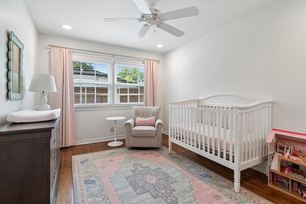11439 Rosser Road Dallas, TX 75229 - Photo 25 of 35 a bedroom with furniture and a window
