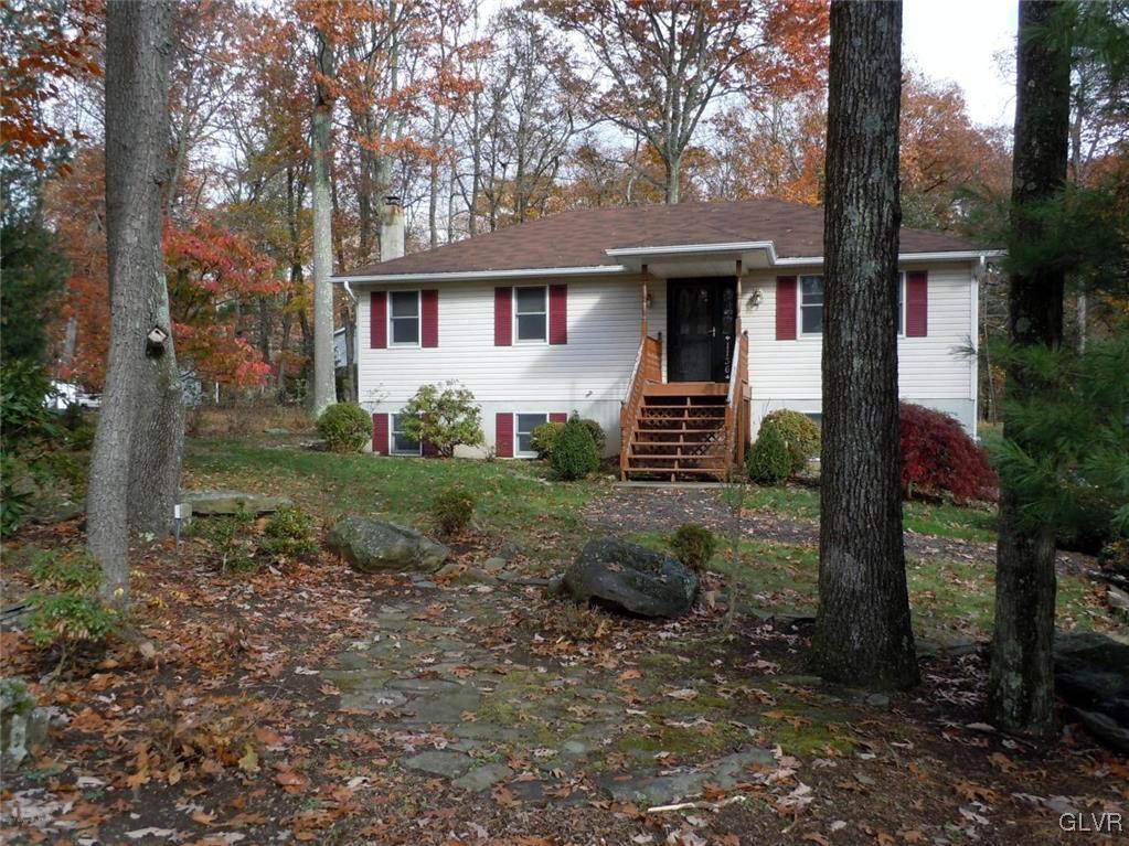 1136 Mattioli Road Bartonsville, PA 18321 - Photo 2 of 30 a front view of a house with garden