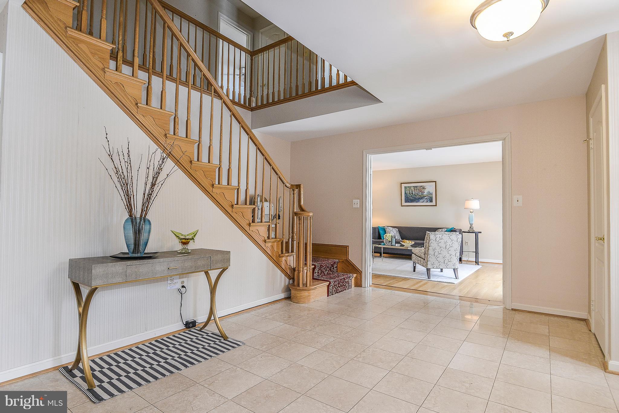 8670 Center Road Springfield, VA 22152 - Photo 2 of 33 Dramatic, spacious entryway, dual coat closets