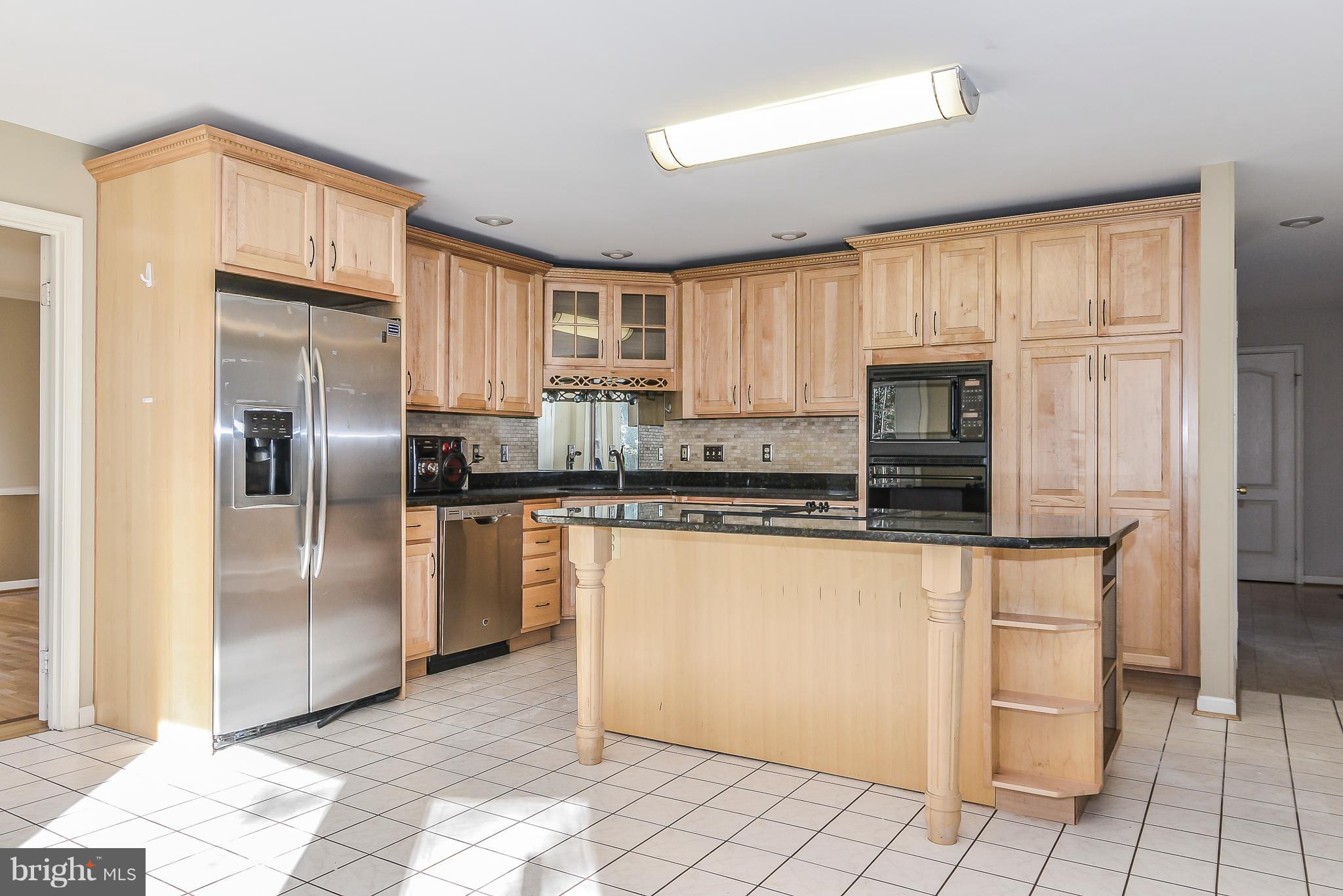 8670 Center Road Springfield, VA 22152 - Photo 12 of 33 Great flow from kitchen to family room