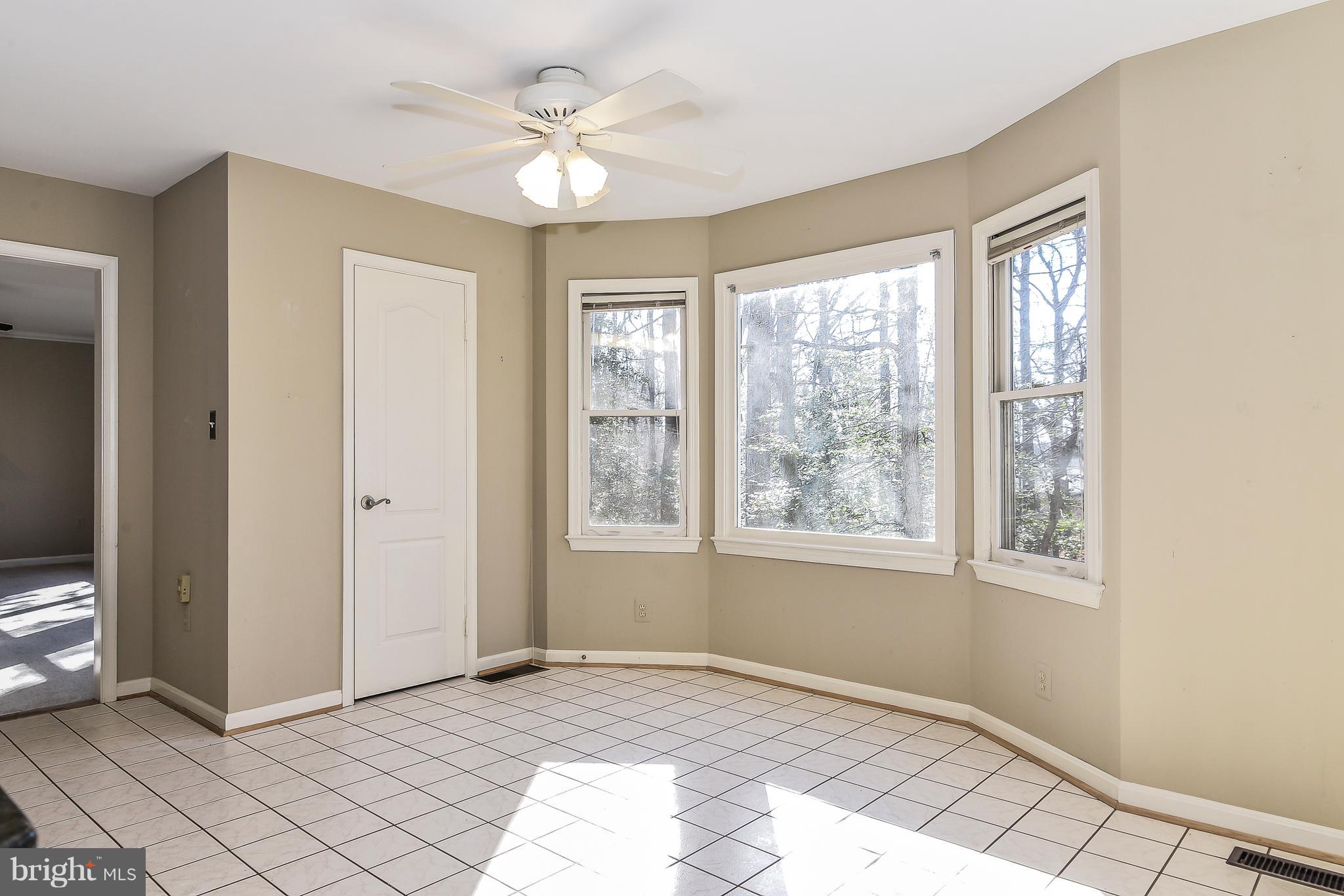 8670 Center Road Springfield, VA 22152 - Photo 13 of 33 Sun splashed breakfast room w/ pantry closet