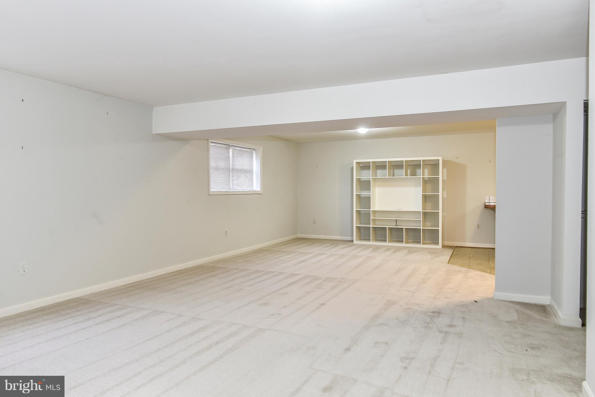 8670 Center Road Springfield, VA 22152 - Photo 27 of 33 Recreation room w/ brand new carpet