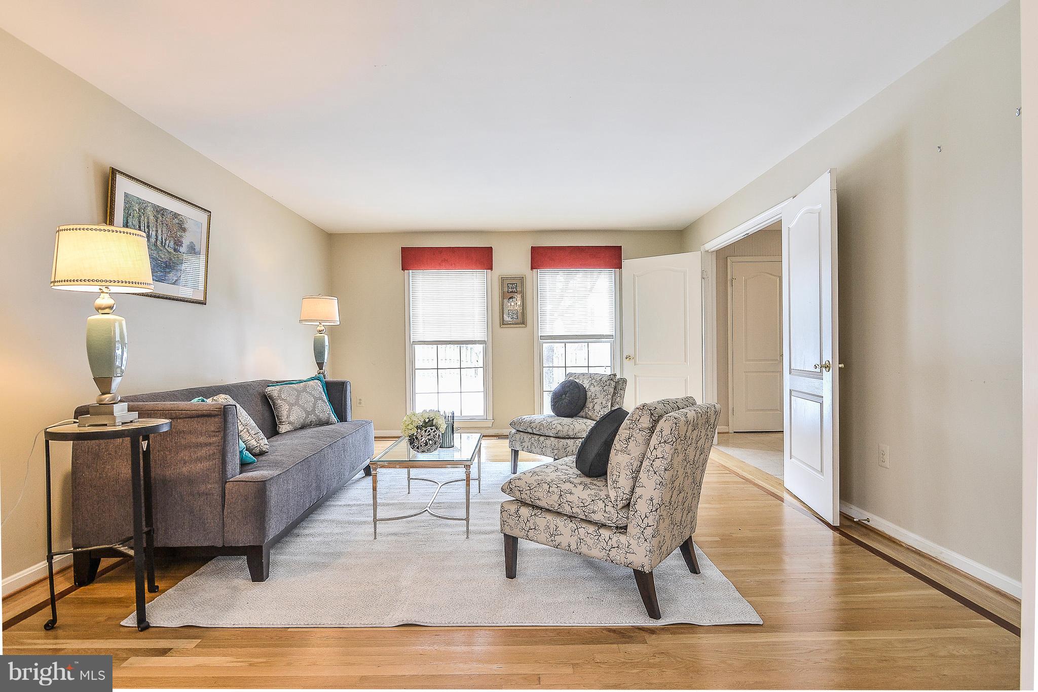 8670 Center Road Springfield, VA 22152 - Photo 5 of 33 Floor to ceiling windows in huge living room