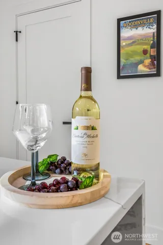 a kitchen with a sink stainless steel appliances and cabinets