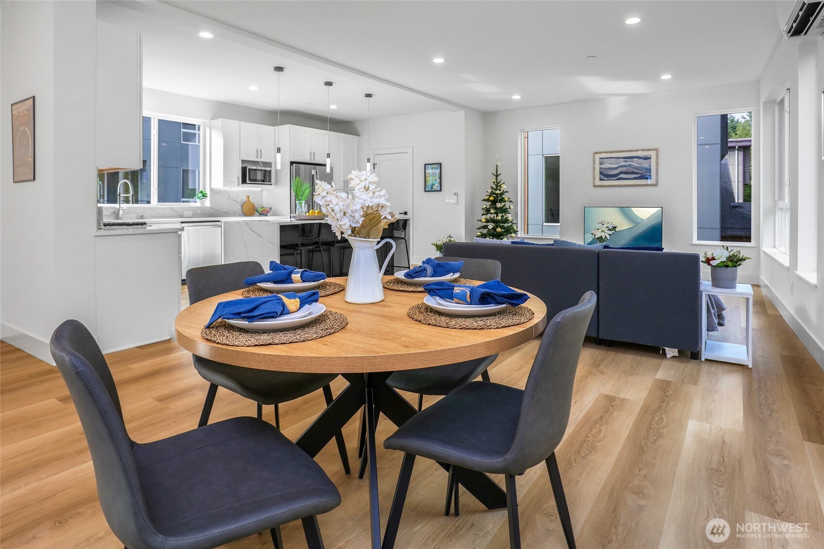 10626 East Riverside Drive Bothell, WA 98011 - Photo 15 of 30 a view of a dining room with furniture and wooden floor