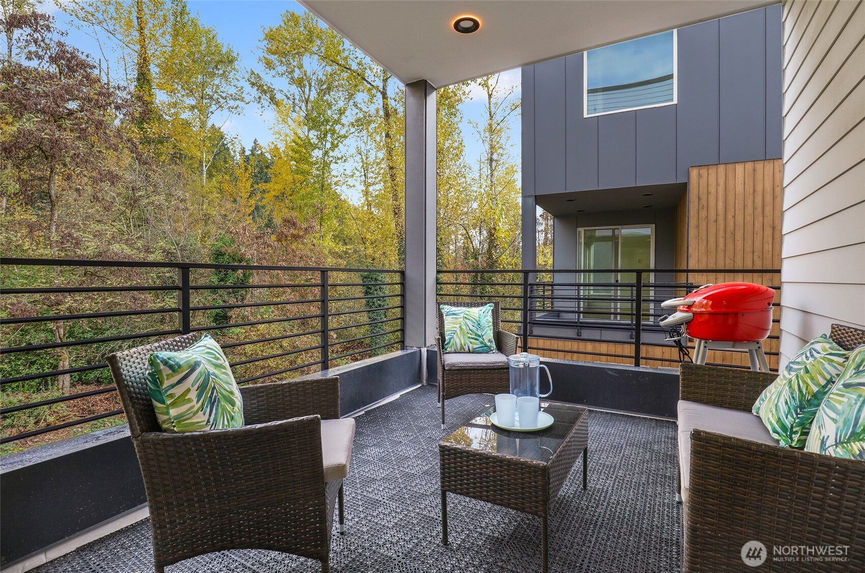 10626 East Riverside Drive Bothell, WA 98011 - Photo 16 of 30 a outdoor living space with furniture and a potted plant