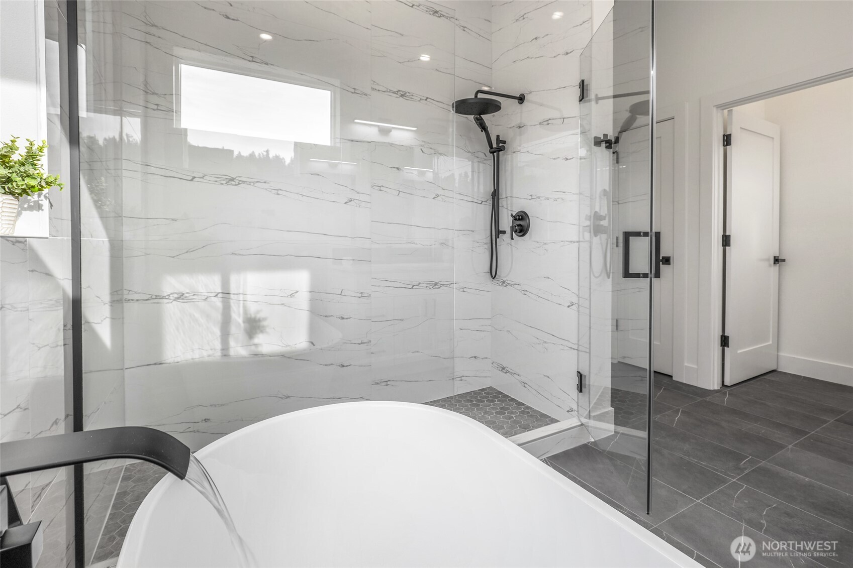 10626 East Riverside Drive Bothell, WA 98011 - Photo 20 of 30 a bathroom with a sink and shower