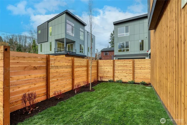 a front view of a house with a garage
