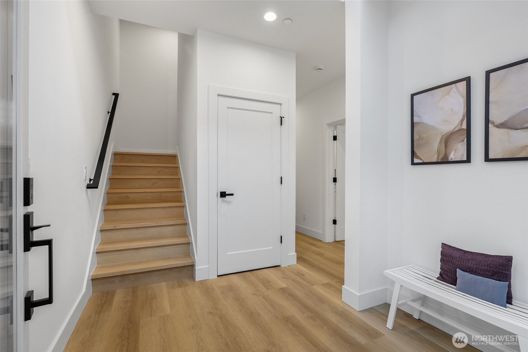 10626 East Riverside Drive Bothell, WA 98011 - Photo 4 of 30 a view of entryway and hall with wooden floor