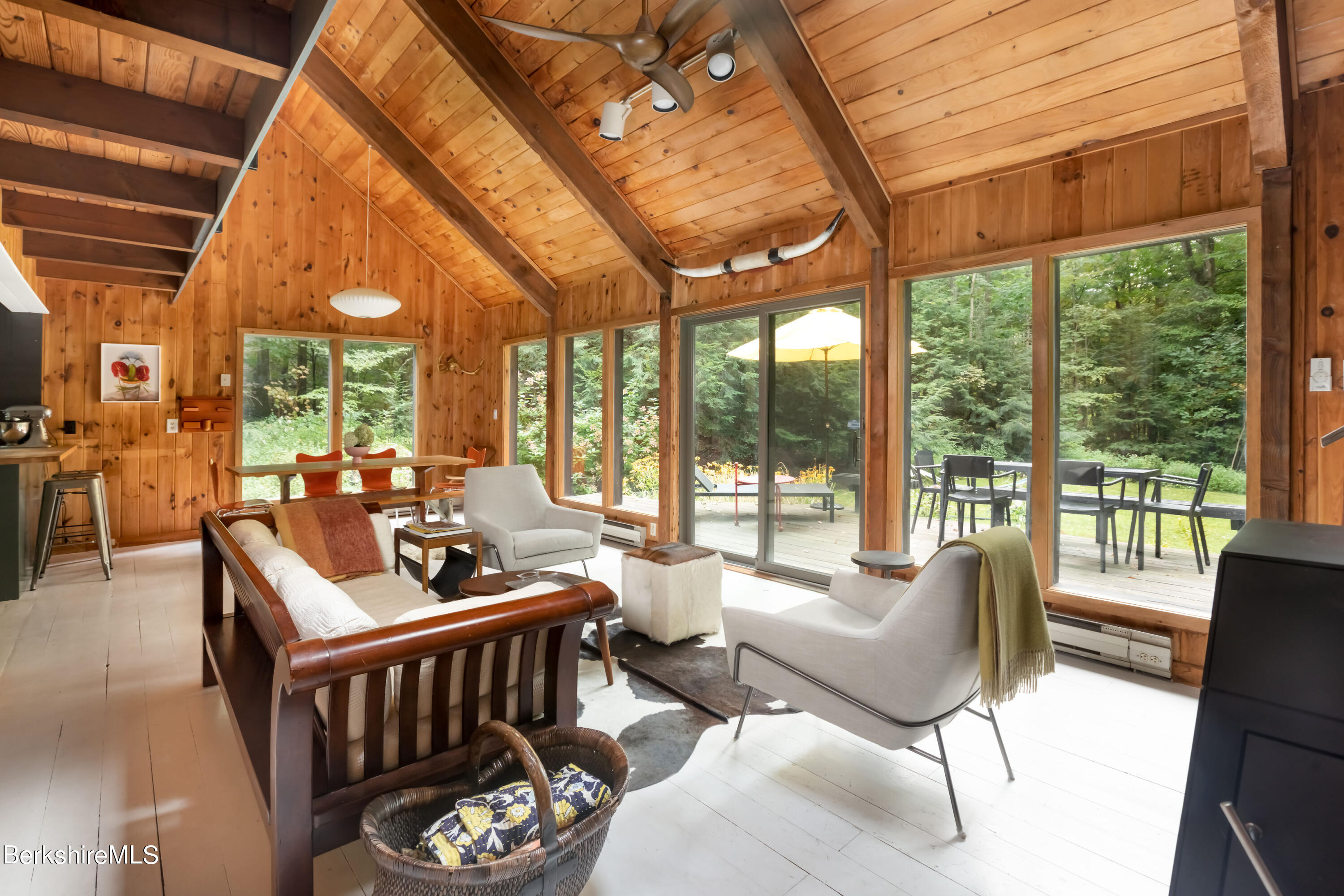 60 New Hartford Road Sandisfield, MA 01255 - Photo 2 of 25 a living room with furniture and a large window