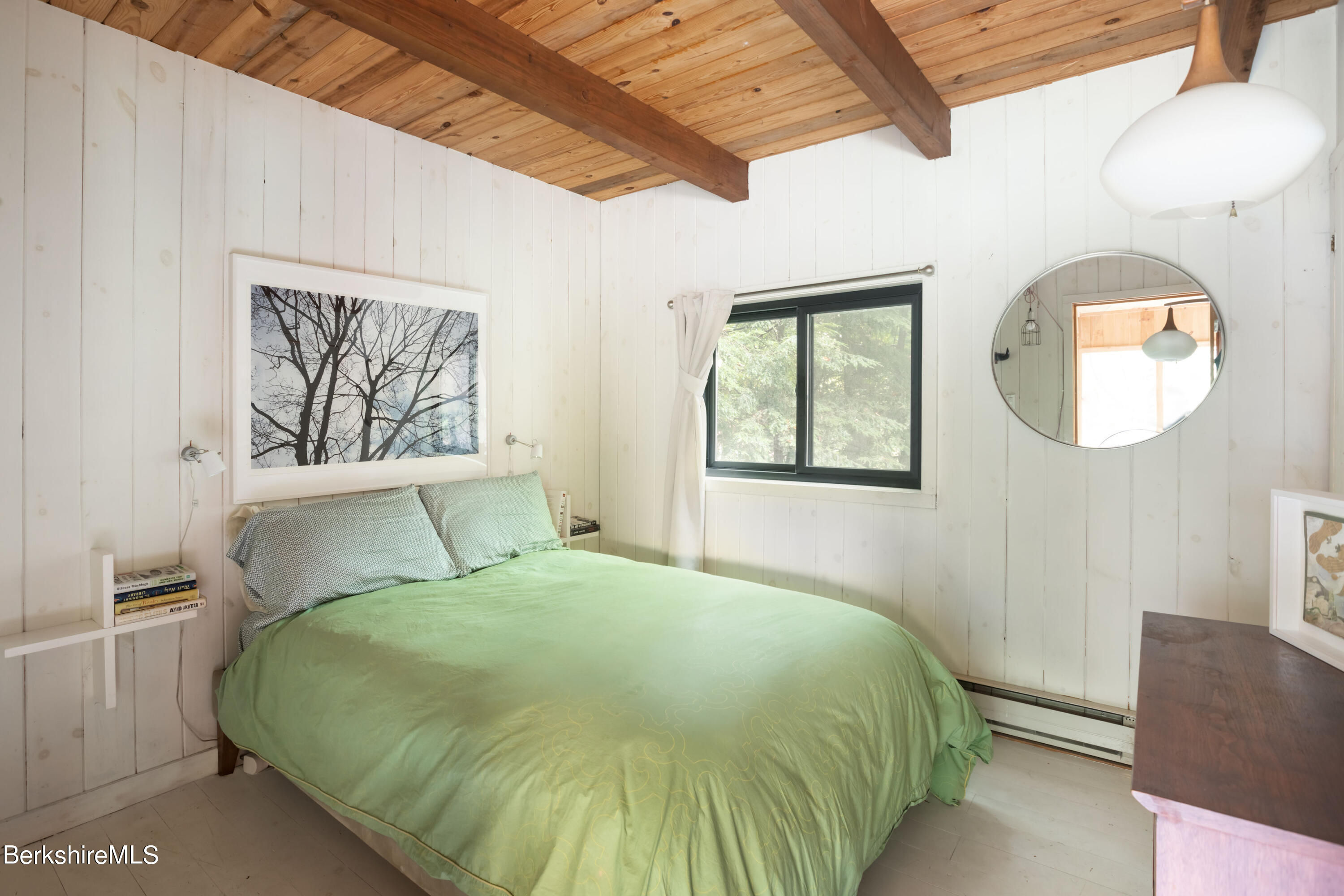 60 New Hartford Road Sandisfield, MA 01255 - Photo 16 of 25 a bedroom with a bed and a painting on the wall