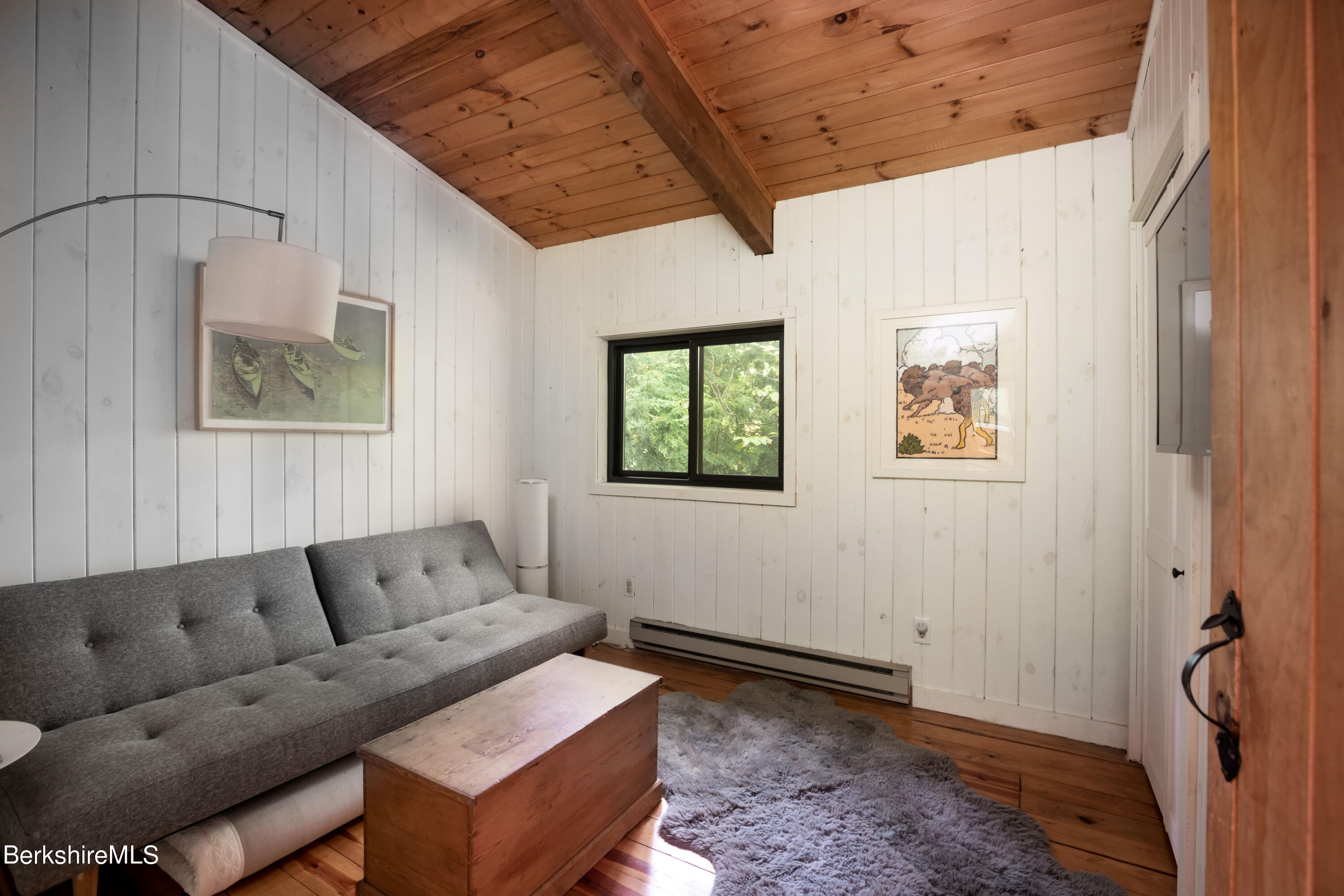 60 New Hartford Road Sandisfield, MA 01255 - Photo 19 of 25 a living room with furniture and a window