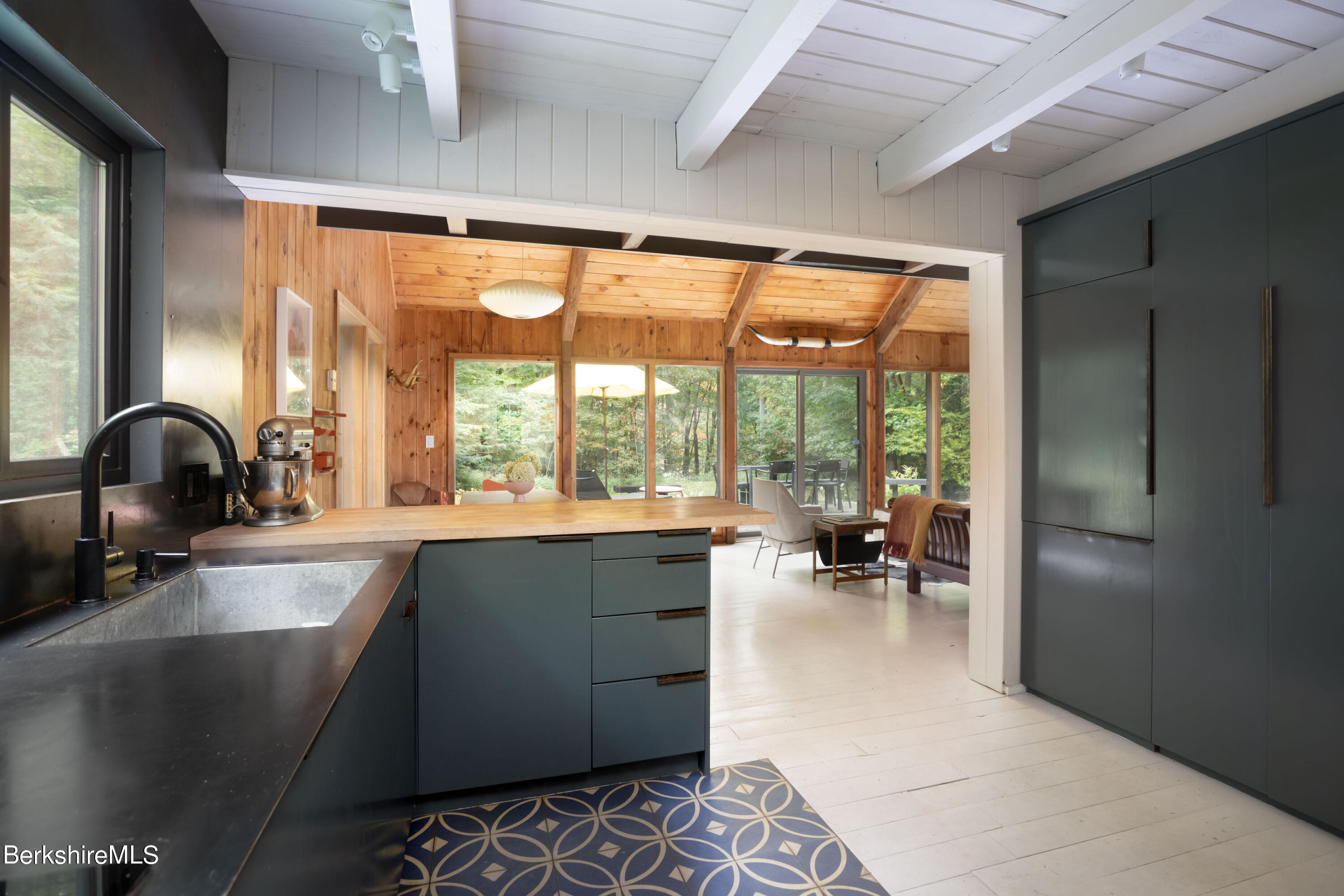 60 New Hartford Road Sandisfield, MA 01255 - Photo 8 of 25 a kitchen with a large window and a sink