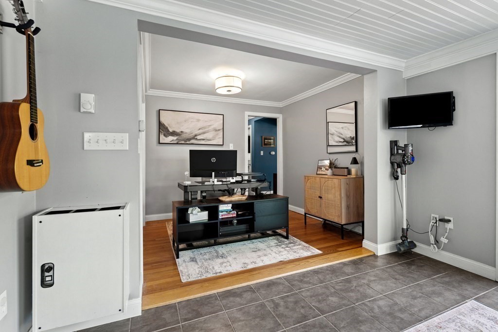70 Indian Hill Road Worcester, MA 01606 - Photo 11 of 34 a view of a livingroom with furniture and a flat screen tv