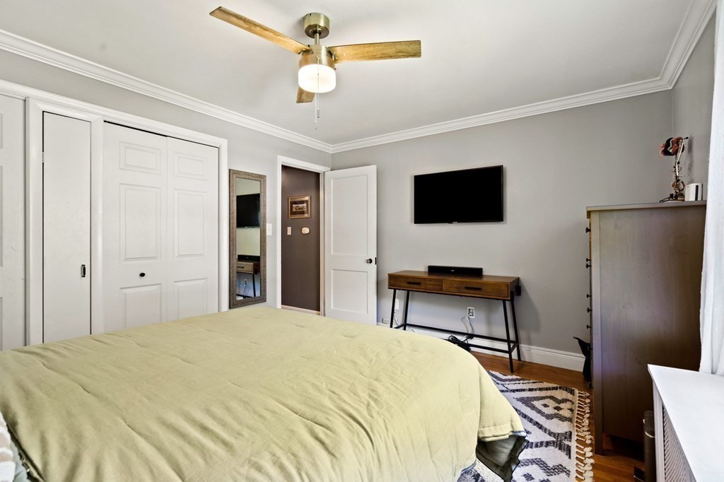 70 Indian Hill Road Worcester, MA 01606 - Photo 16 of 34 a bedroom with a bed and a flat screen tv