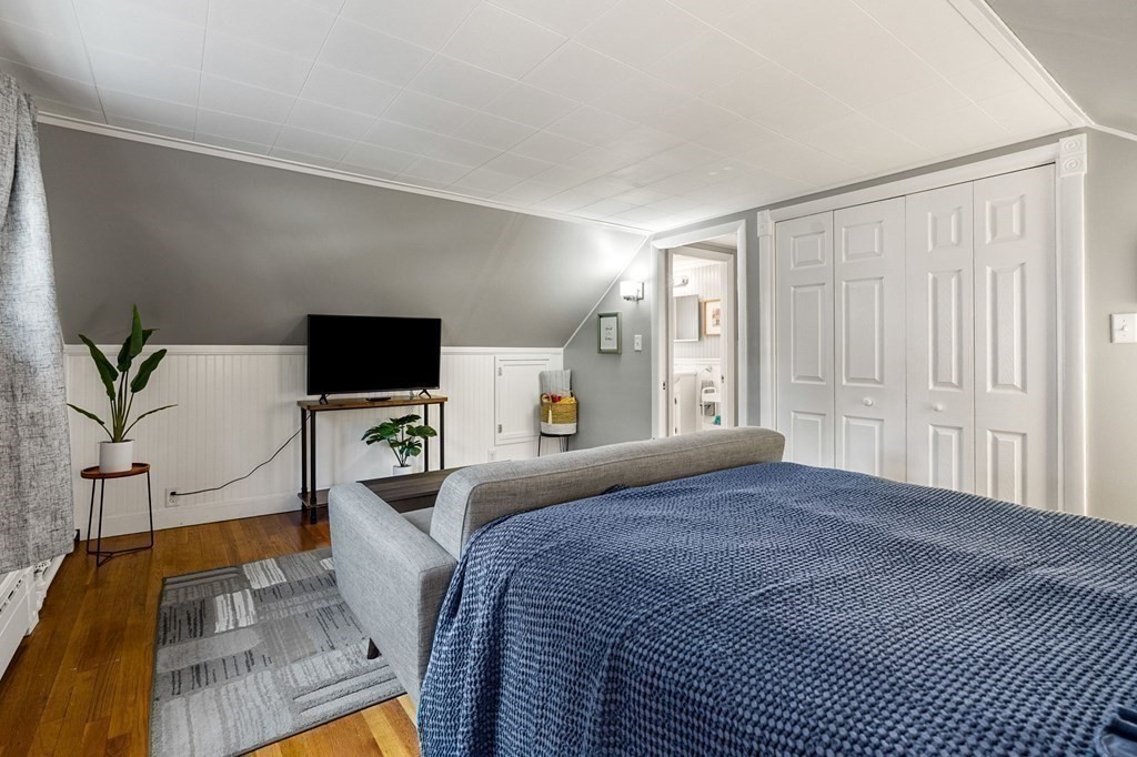 70 Indian Hill Road Worcester, MA 01606 - Photo 19 of 34 a bedroom with a bed and large windows