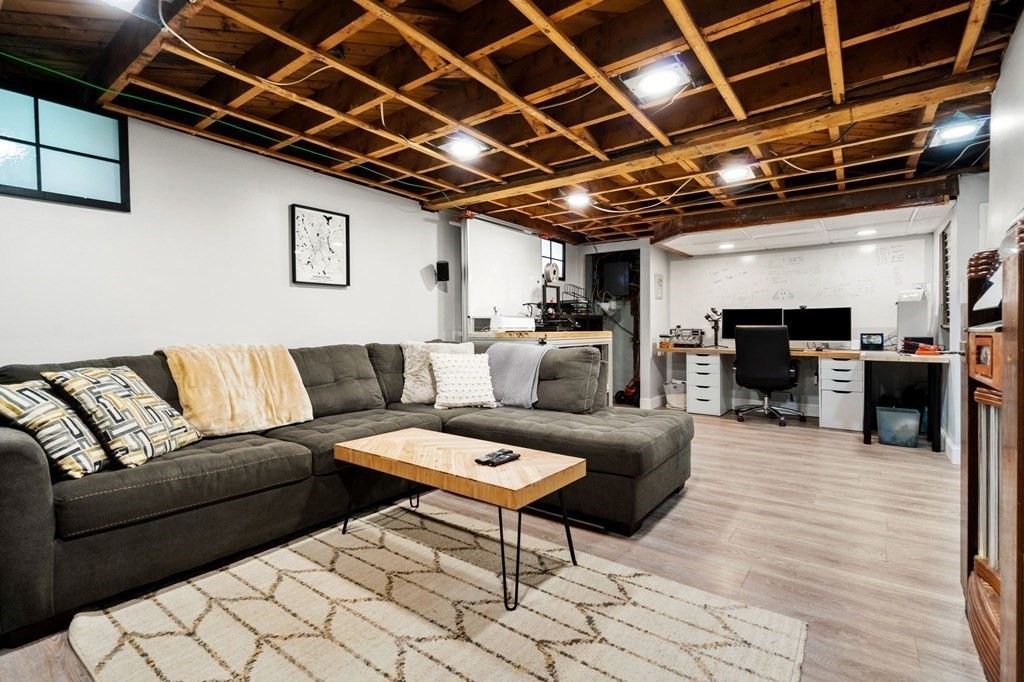 70 Indian Hill Road Worcester, MA 01606 - Photo 26 of 34 a living room with furniture and a fireplace