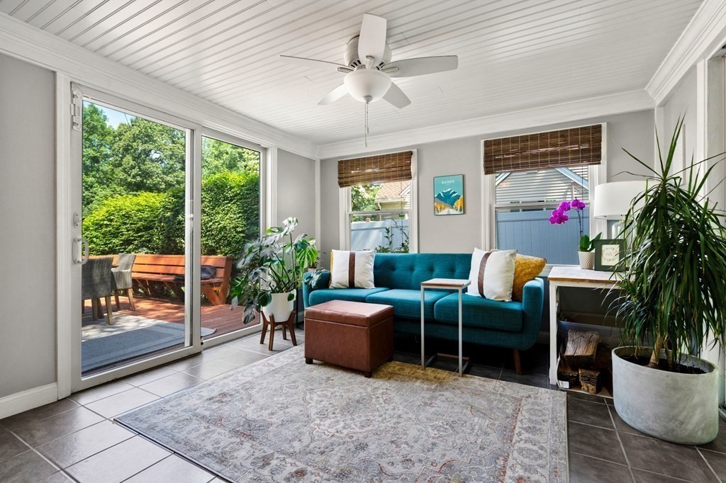 70 Indian Hill Road Worcester, MA 01606 - Photo 10 of 34 a living room with furniture potted plant and a large window