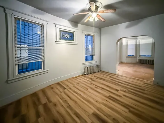 a kitchen with a sink cabinets and window