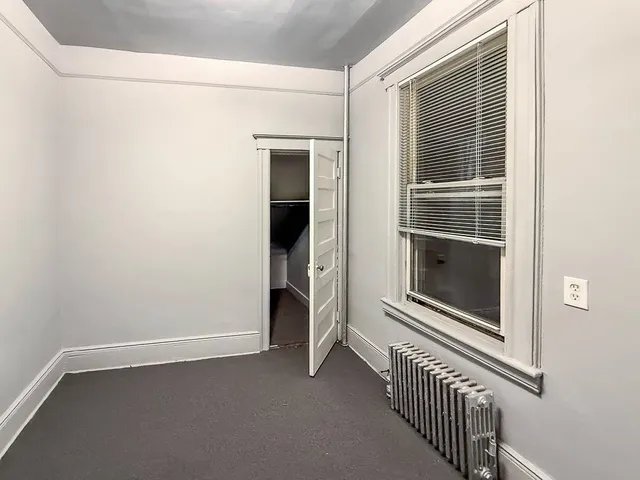 a front view of a house with a window