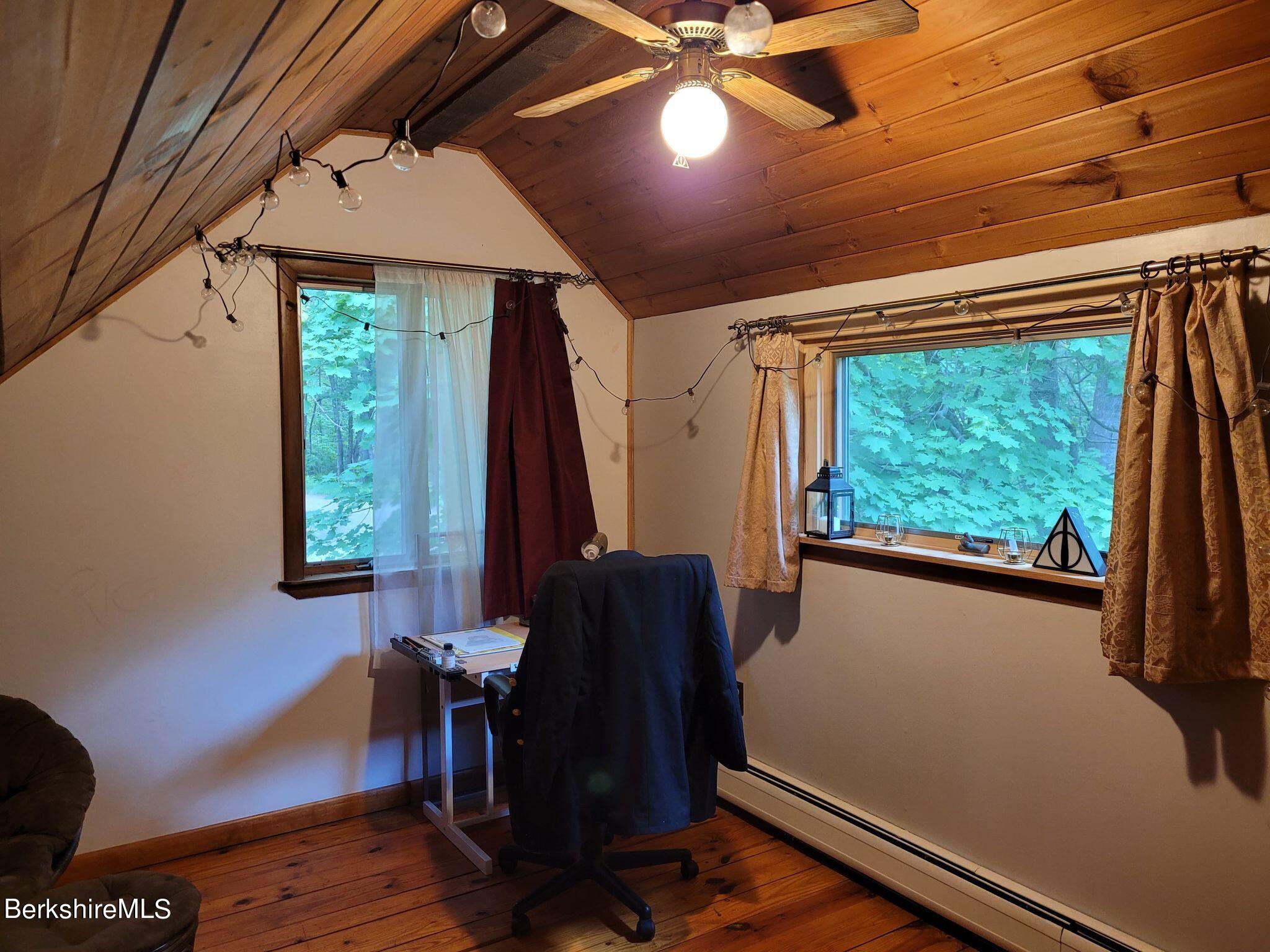 106 Access Road Becket, MA 01223 - Photo 29 of 43 a view of a room with furniture and a window