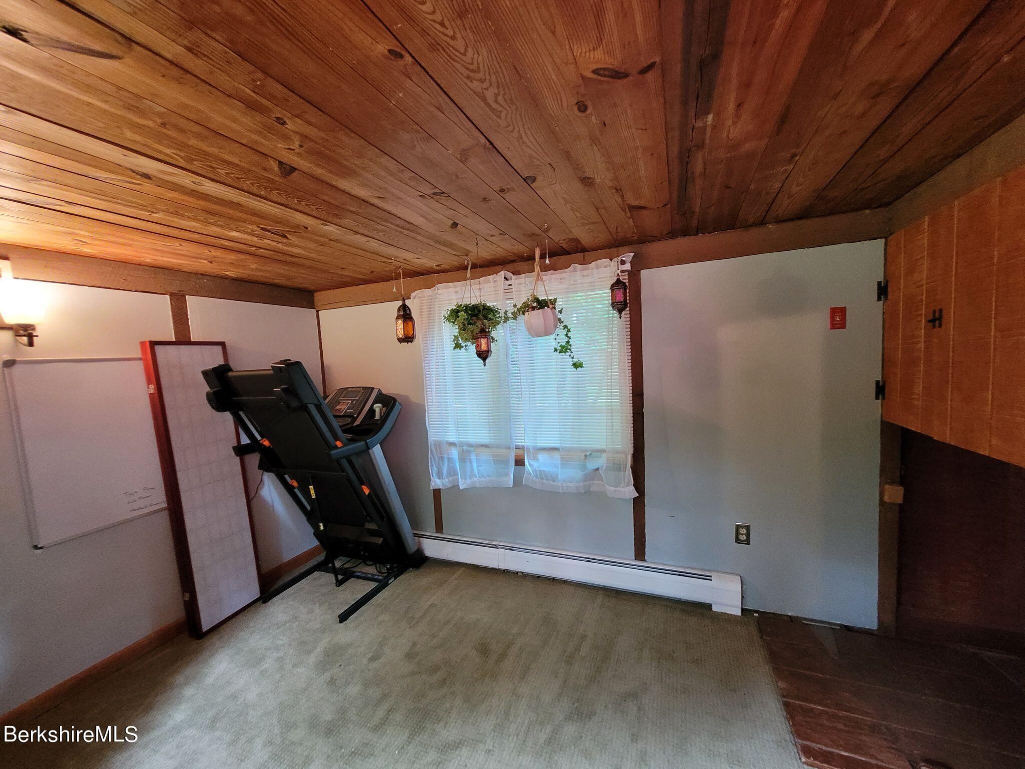 106 Access Road Becket, MA 01223 - Photo 31 of 43 a view of a room with gym equipment