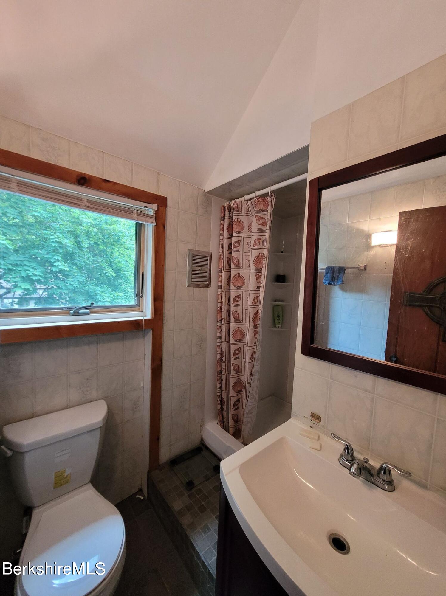 106 Access Road Becket, MA 01223 - Photo 32 of 43 a bathroom with a sink toilet and shower