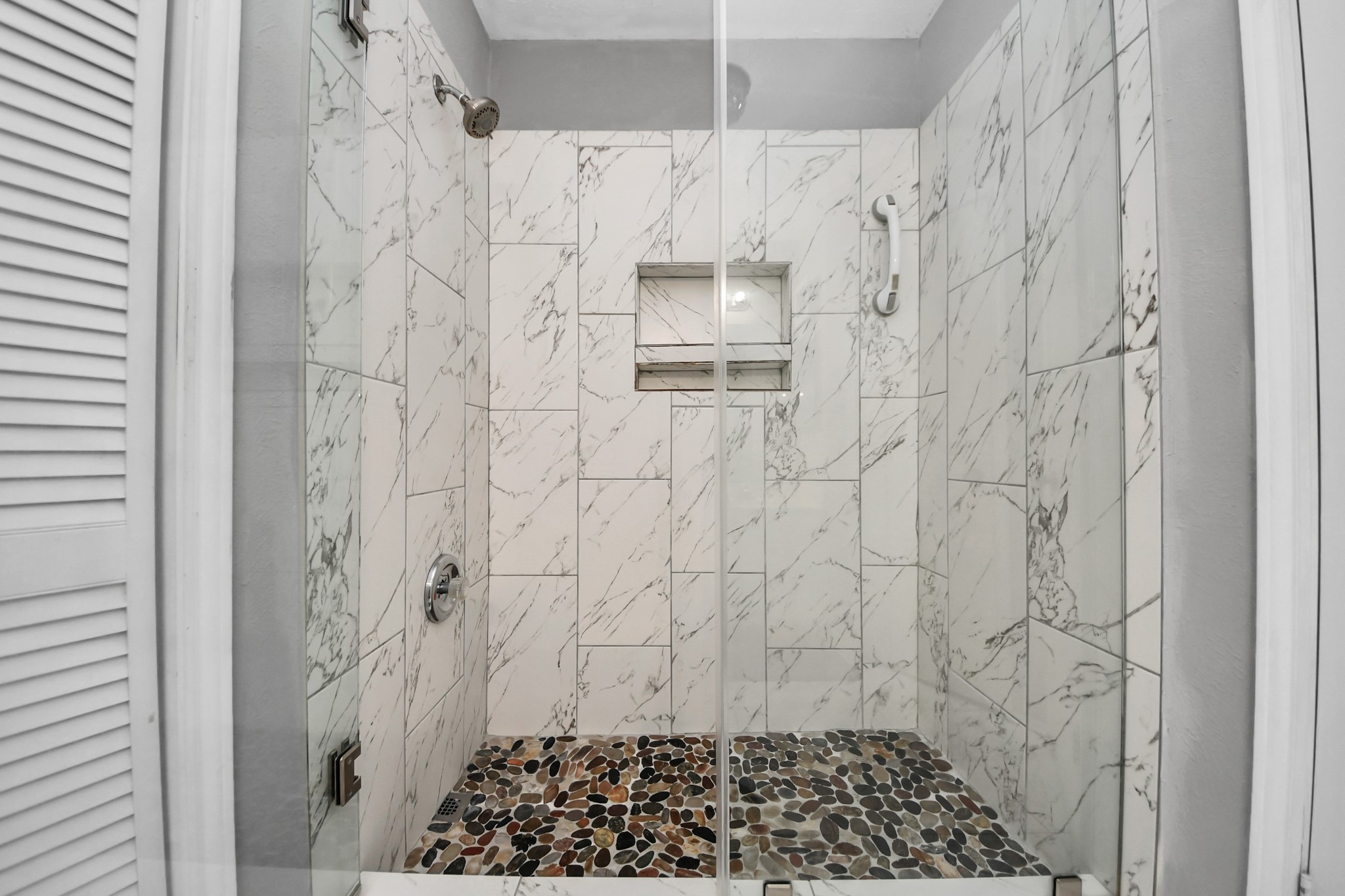 17702 Poppy Trails Lane Houston, TX 77084 - Photo 25 of 37 A closeup of this modern, updated shower.