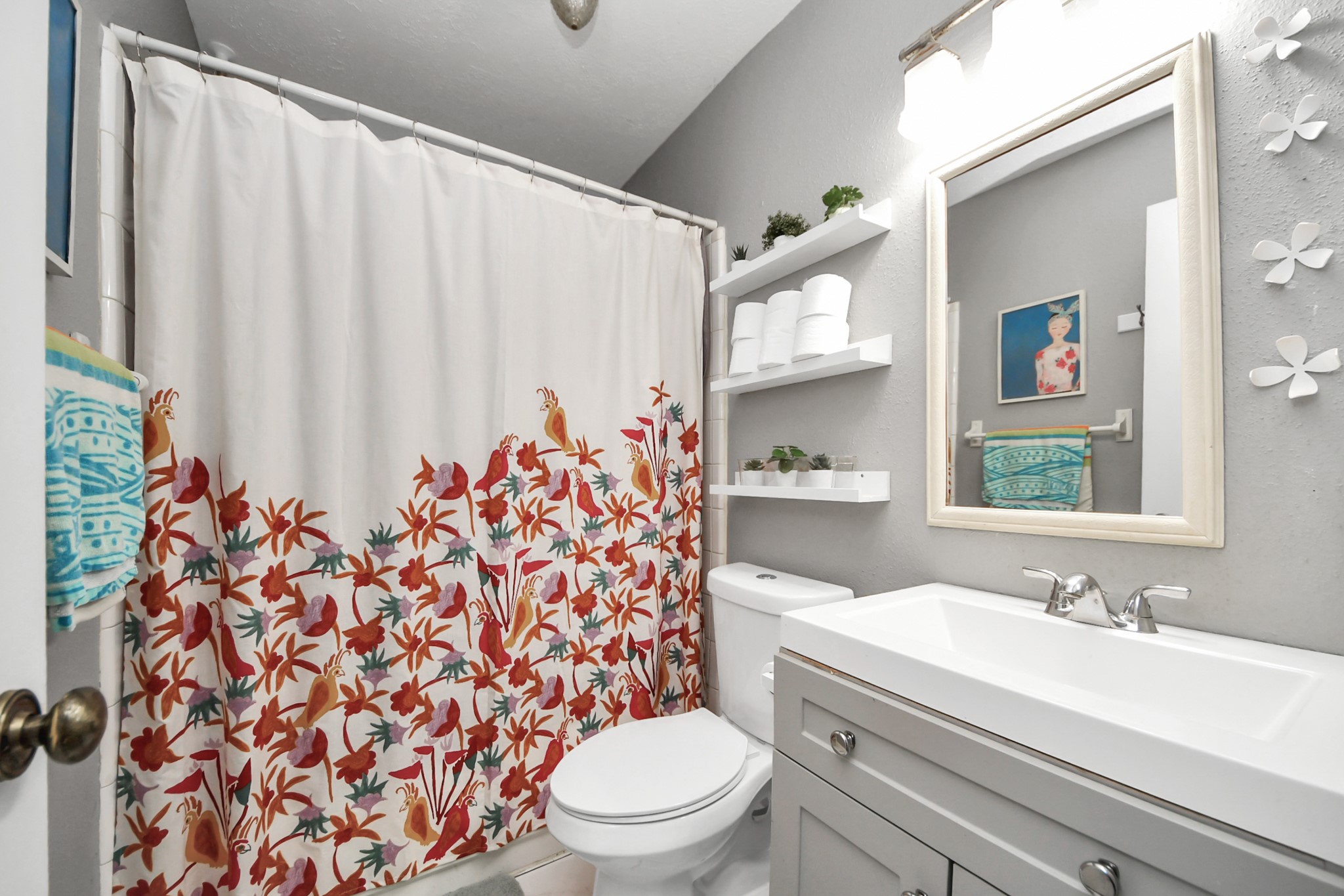 17702 Poppy Trails Lane Houston, TX 77084 - Photo 28 of 37 This bright secondary bathroom is thoughtfully designed with bright colored walls and a versatile tub/shower combo.