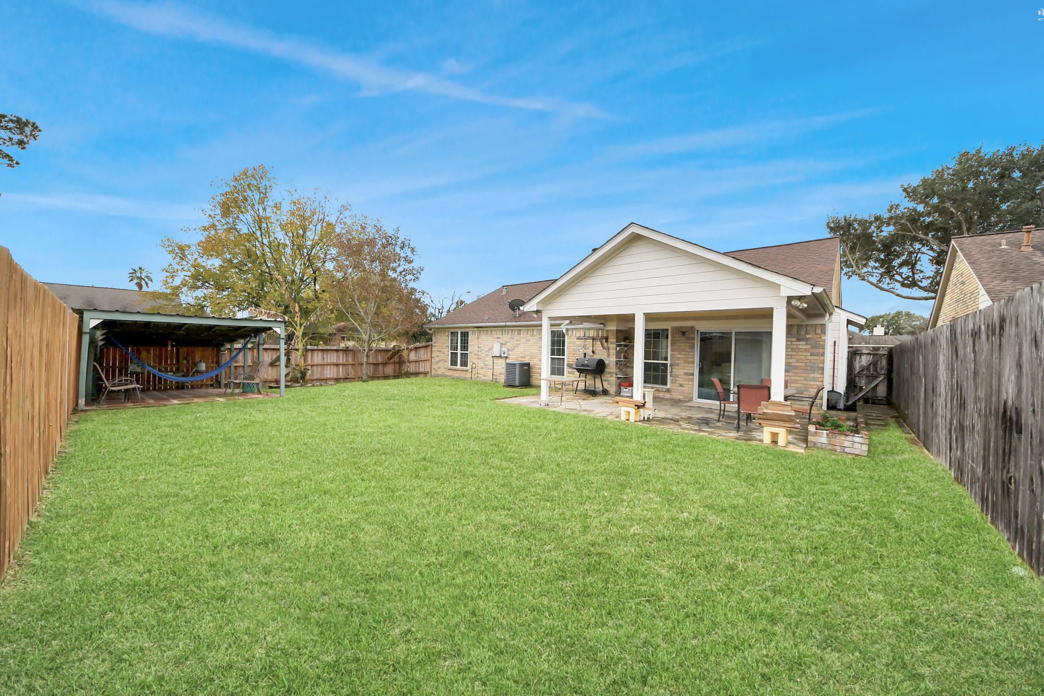 17702 Poppy Trails Lane Houston, TX 77084 - Photo 33 of 37 This looks like the perfect outdoor space for summer BBQs and backyard birthday parties, maybe building a pool could be in your plans for later...