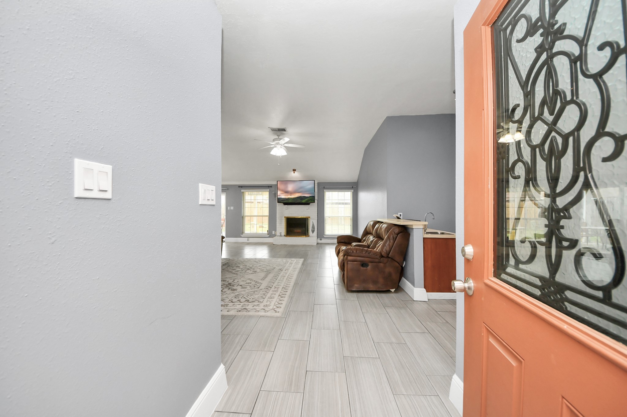 17702 Poppy Trails Lane Houston, TX 77084 - Photo 6 of 37 Step into comfort with a welcoming well-maintained entrance, no carpet throughout, open concept design and more.