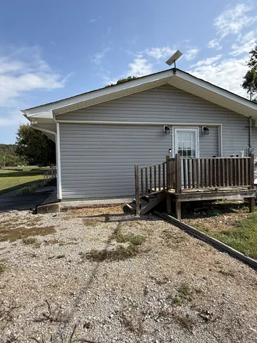 a house with yard in front of it