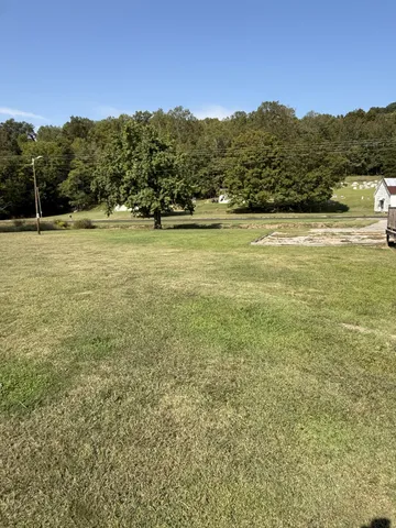 a view of an ocean and mountains