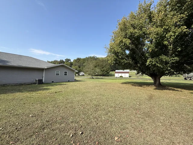 a house with trees in front of it