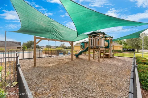 a view of a backyard with a patio