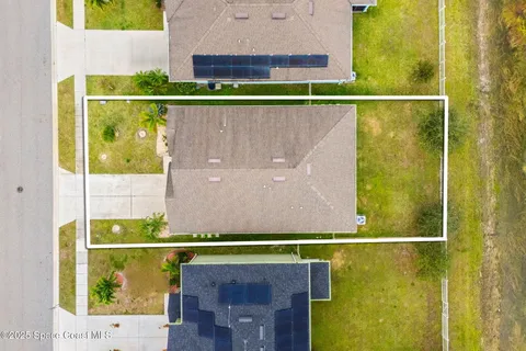 a bird view of a swimming pool