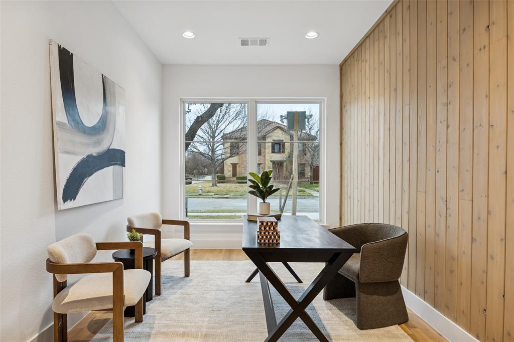 5600 Ellsworth Avenue Dallas, TX 75206 - Photo 2 of 31 a living room with furniture and a large window