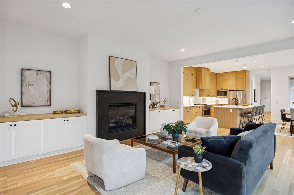 5600 Ellsworth Avenue Dallas, TX 75206 - Photo 3 of 31 a living room with furniture and a fireplace