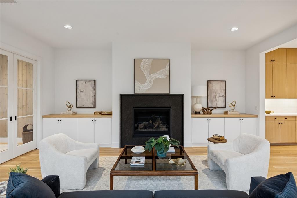 5600 Ellsworth Avenue Dallas, TX 75206 - Photo 4 of 31 a living room with furniture and a fireplace