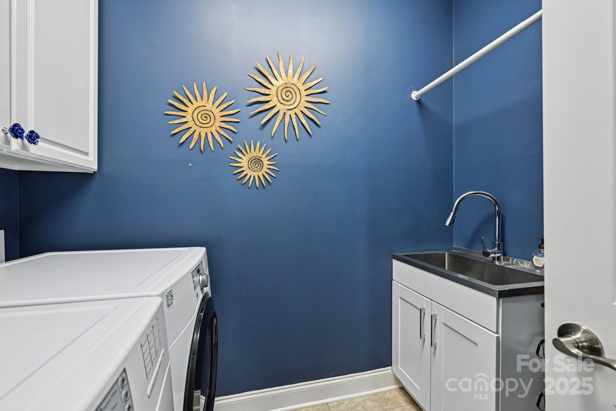 1293 Restoration Drive Waxhaw, NC 28173 - Photo 22 of 41 a utility room with dryer and washer