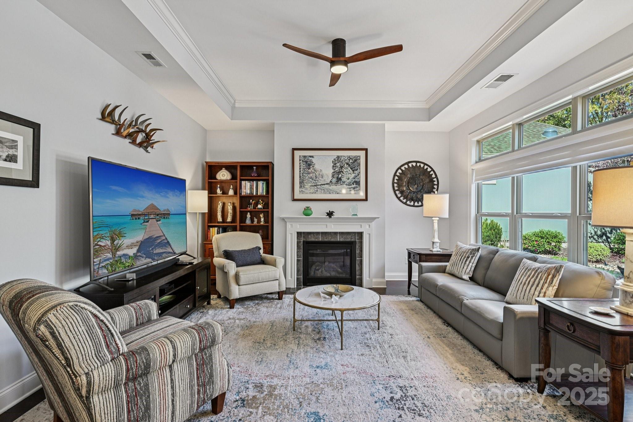 1293 Restoration Drive Waxhaw, NC 28173 - Photo 4 of 41 a living room with furniture fireplace and a large window