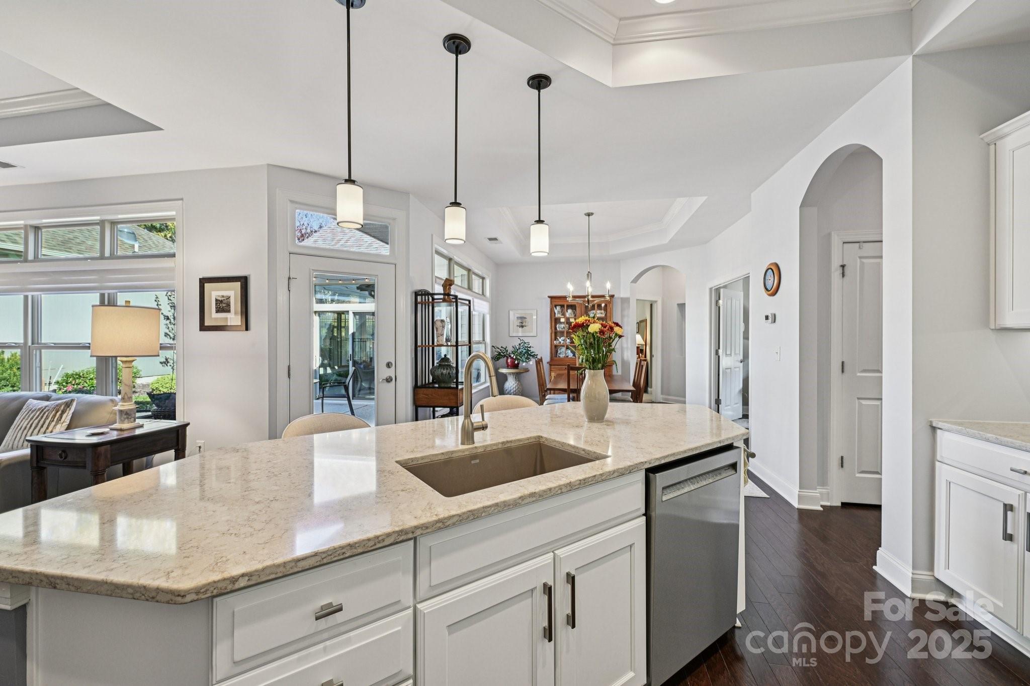 1293 Restoration Drive Waxhaw, NC 28173 - Photo 9 of 41 a kitchen with counter top space and living room