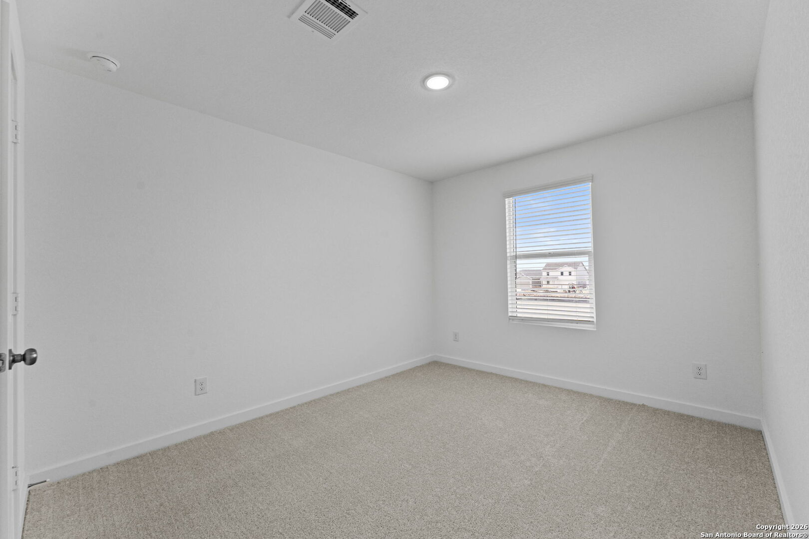 1859 Nuthatch Ridge New Braunfels, TX 78130 - Photo 28 of 34 a view of an empty room with a window