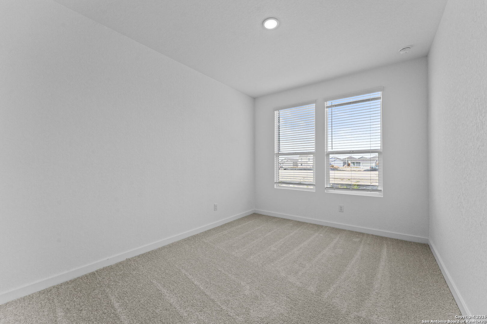 1859 Nuthatch Ridge New Braunfels, TX 78130 - Photo 4 of 34 an empty room with a window