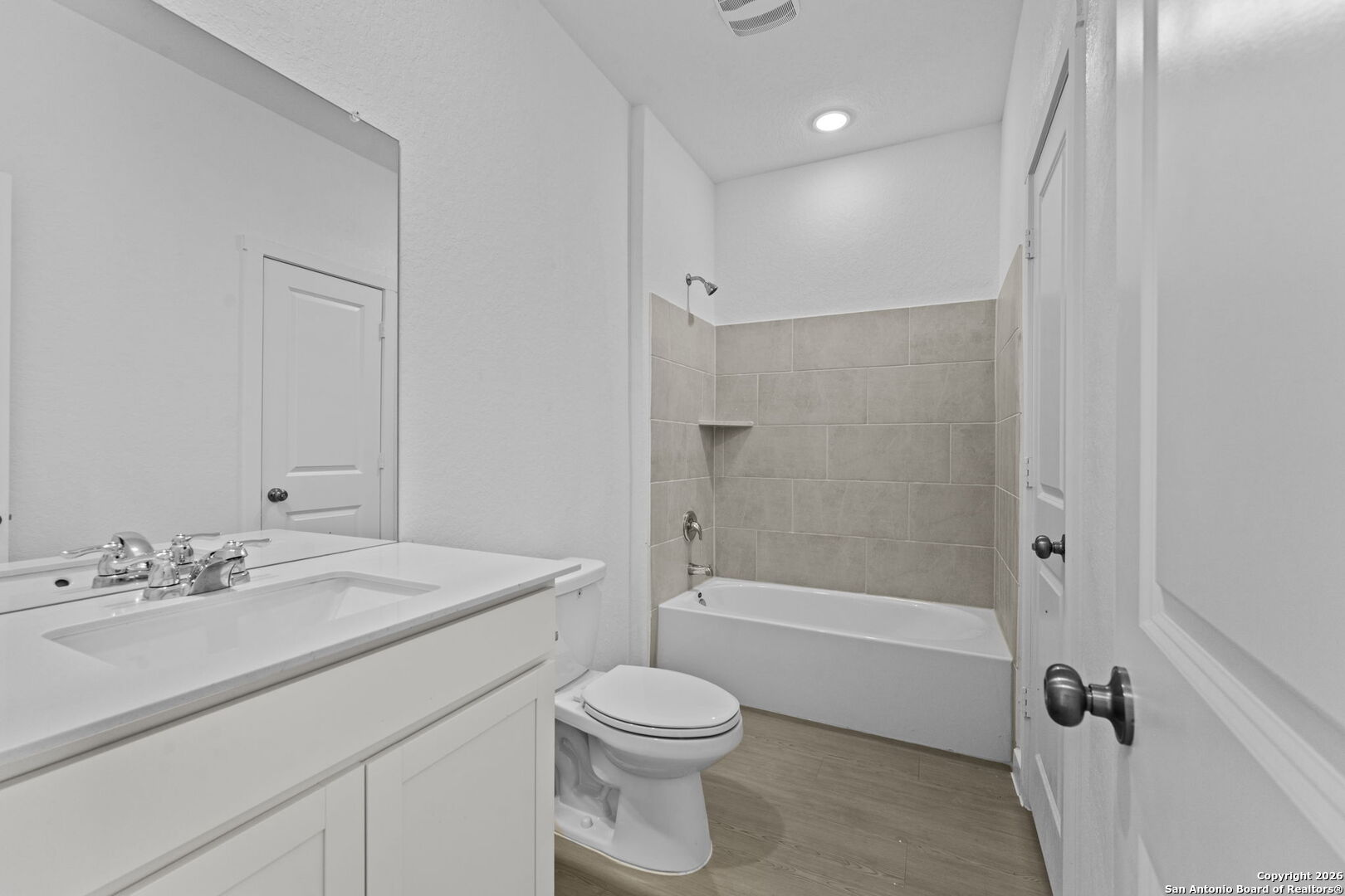 1859 Nuthatch Ridge New Braunfels, TX 78130 - Photo 6 of 34 a bathroom with a sink toilet and shower