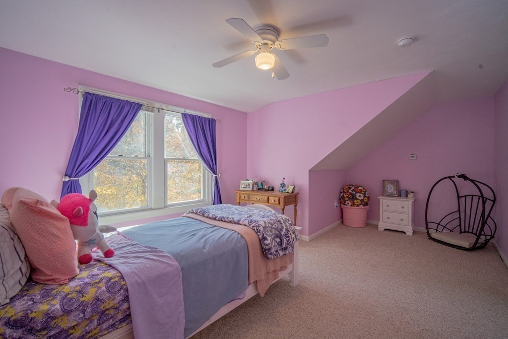 151 Fuller Street Middleboro, MA 02346 - Photo 16 of 24 a bedroom with a bed and a large window