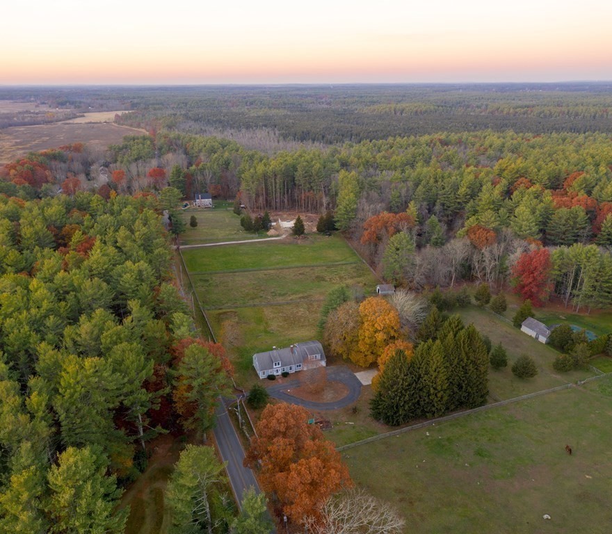 151 Fuller Street Middleboro, MA 02346 - Photo 23 of 24 a view of a city with lush green forest